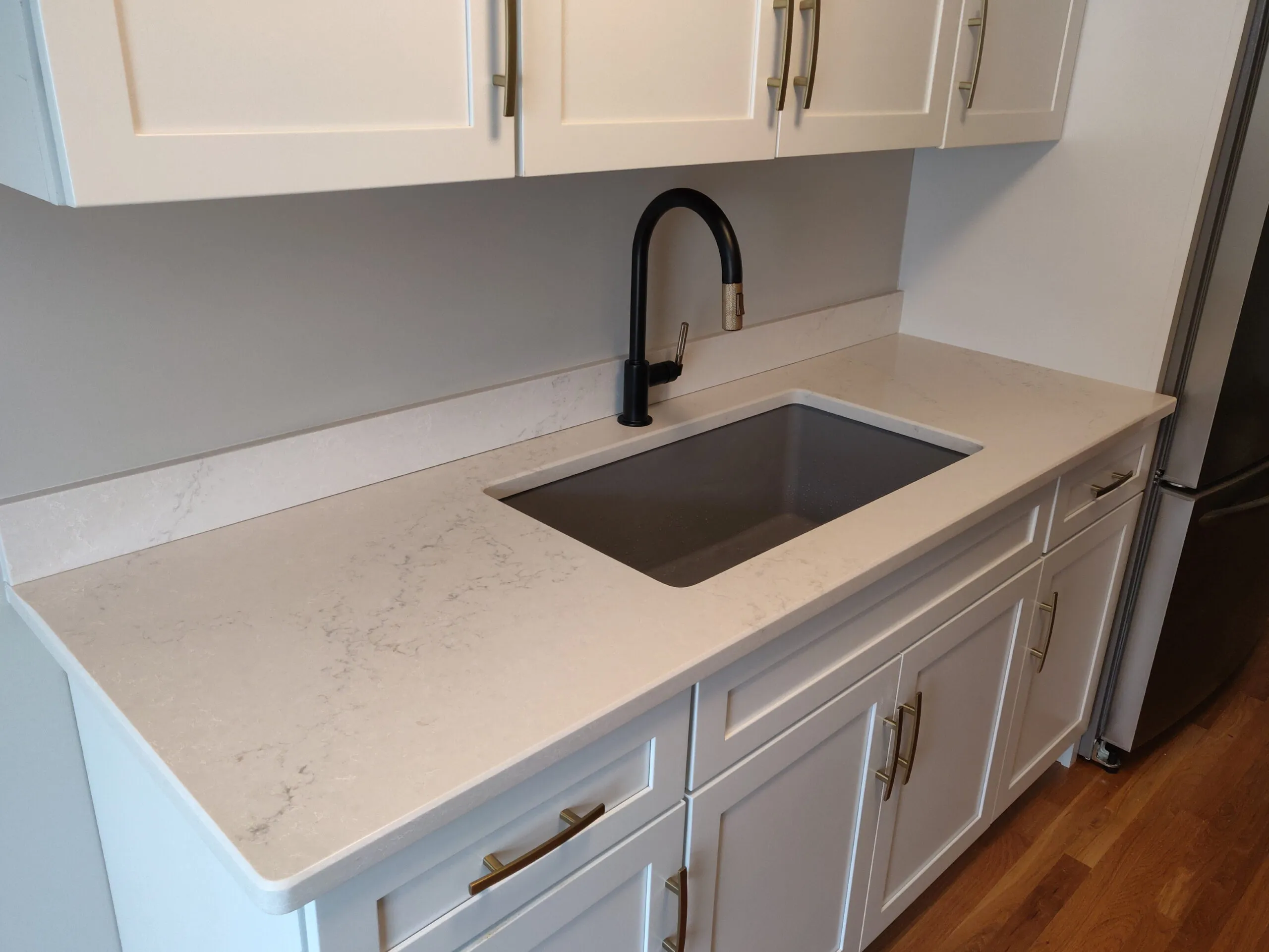Custom bathroom stone vanity and shower detail